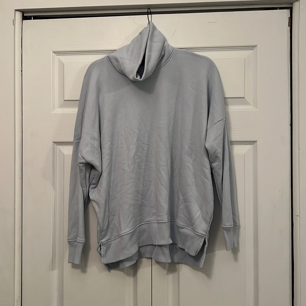 Baby blue sweatshirt.